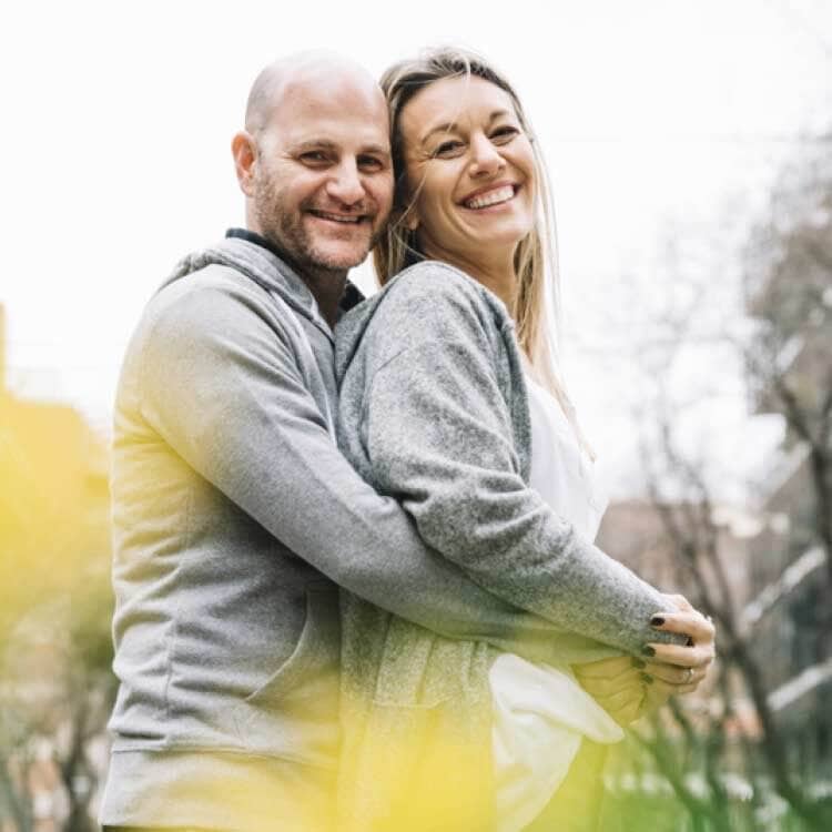 Man and woman, couple, hugging and smiling