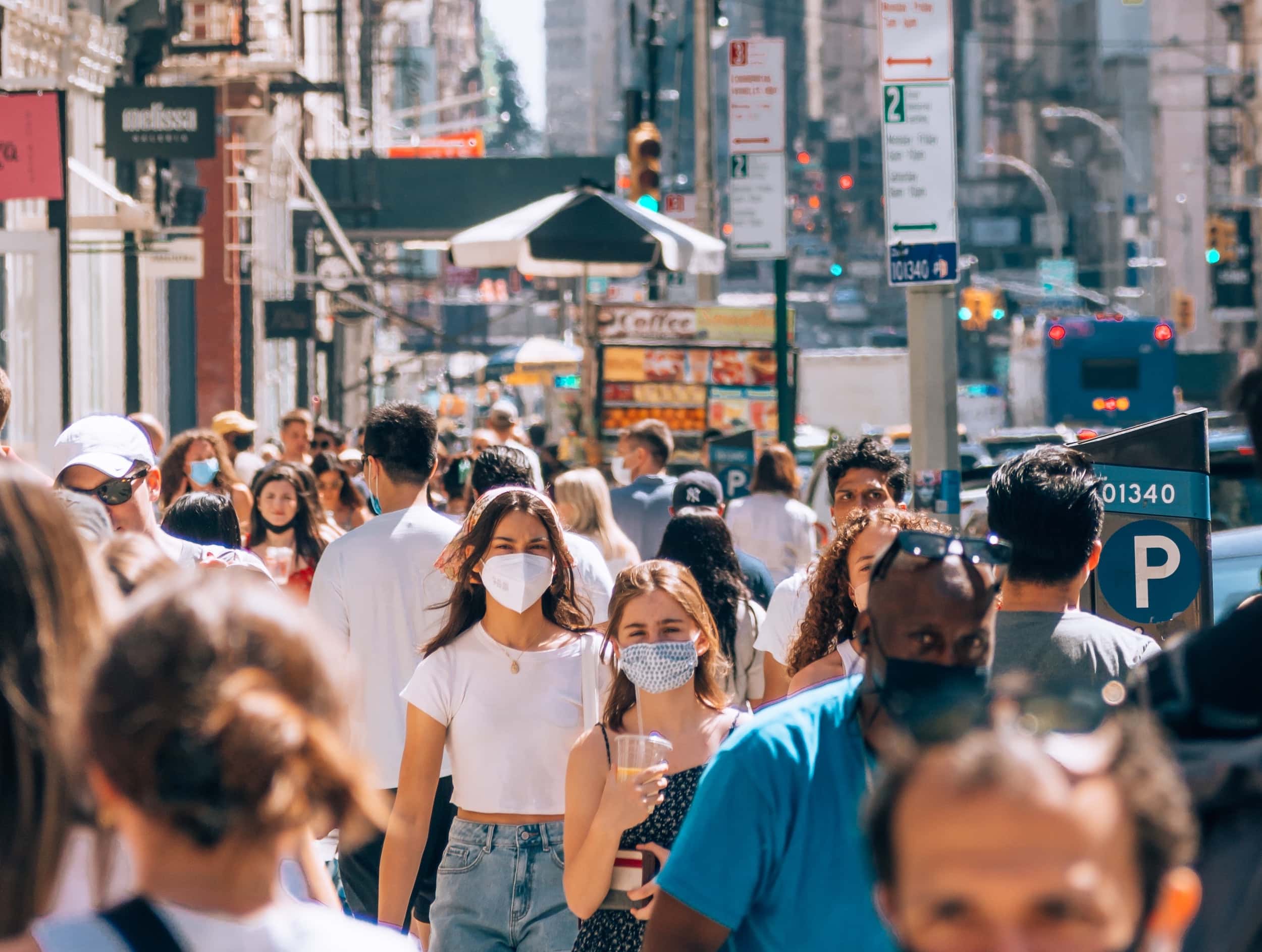 City crowd wearing masks during the COVID pandemic