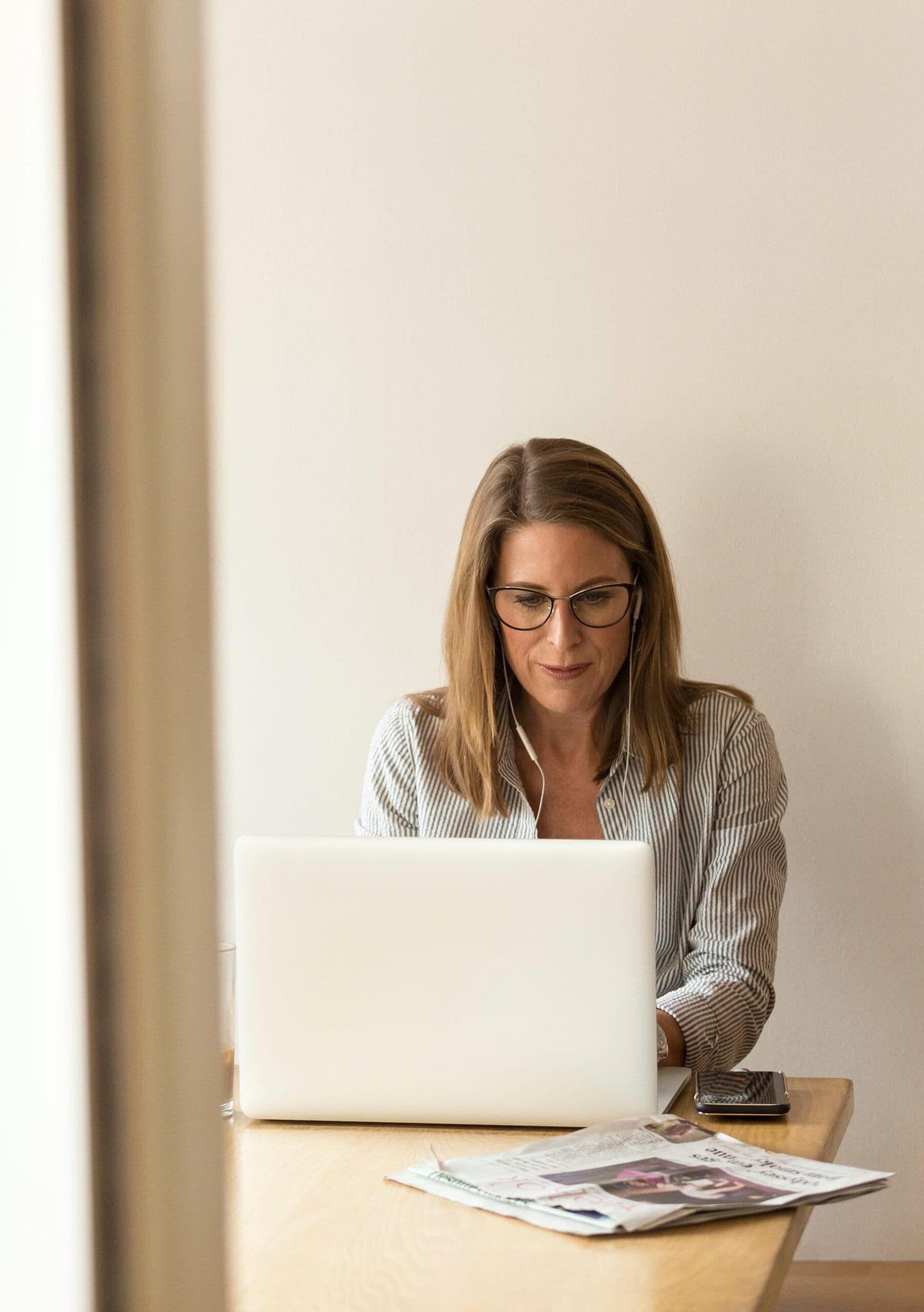 Woman on laptop researching new male infertility study