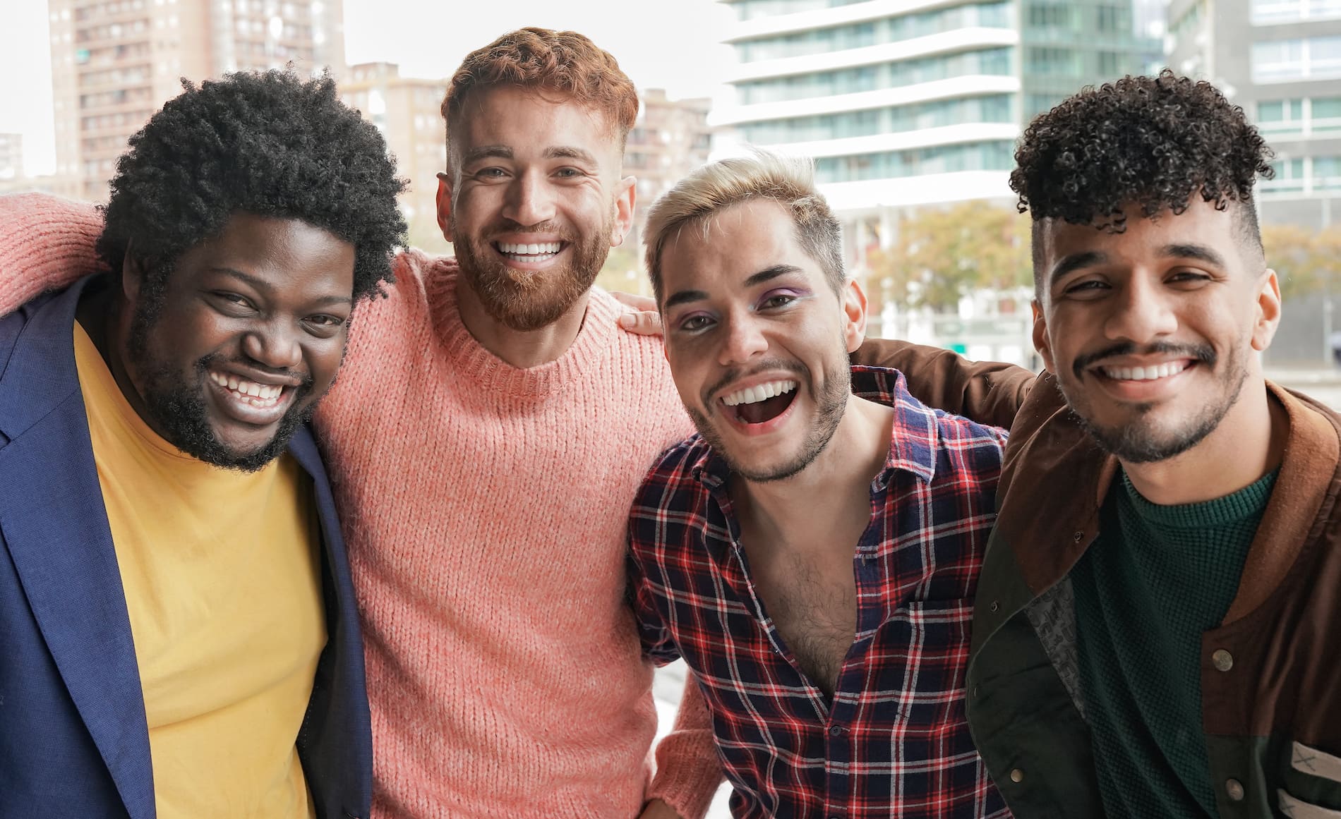 Group of young diverse men smiling, who should freeze their sperm