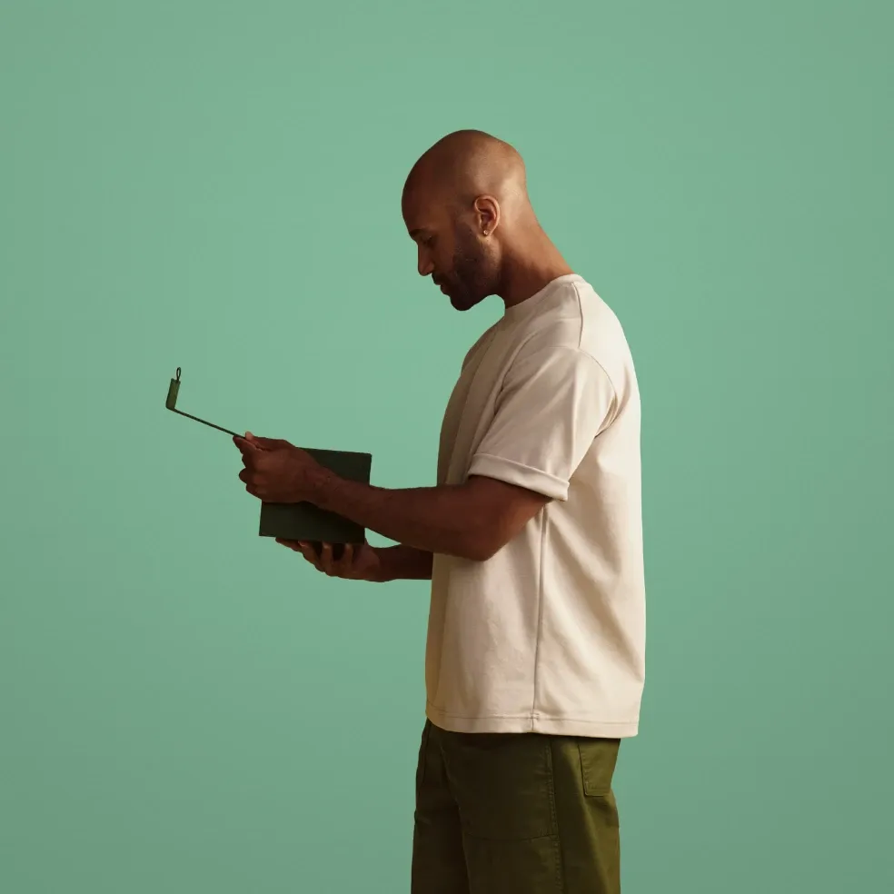 Mad holding kit with green background Mad holding kit with green background