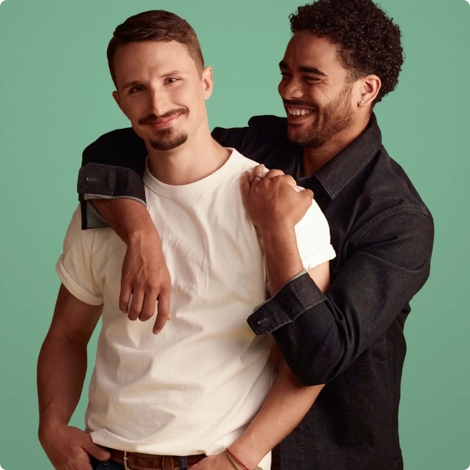 Male couple with green background