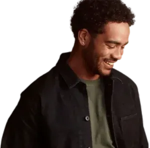 Smiling man looking down close up